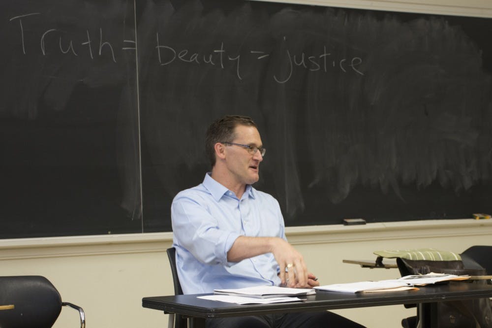 <p>Charlottesville Mayor Mike Signer teaching his graduate-level politics class at the University of Virginia.</p>