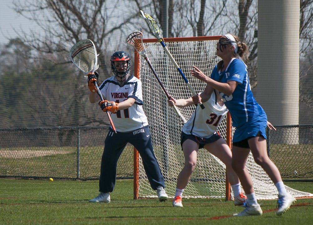 <p>Freshman goalie Rachel Vander Kolk made 18 saves in the Cavaliers' fifth consecutive win. She is the second Virginia goalie to record 15-plus saves in a game since 2009. </p>
