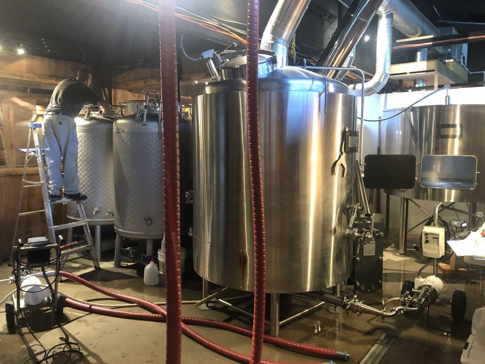<p>Jesse Pappas and John Bryce worked with property owners Ed and Regina Pierce to add a 10-barrel American-made brewhouse to the winery, making this winery-brewery combination the first to appear in Albemarle County.&nbsp;</p>