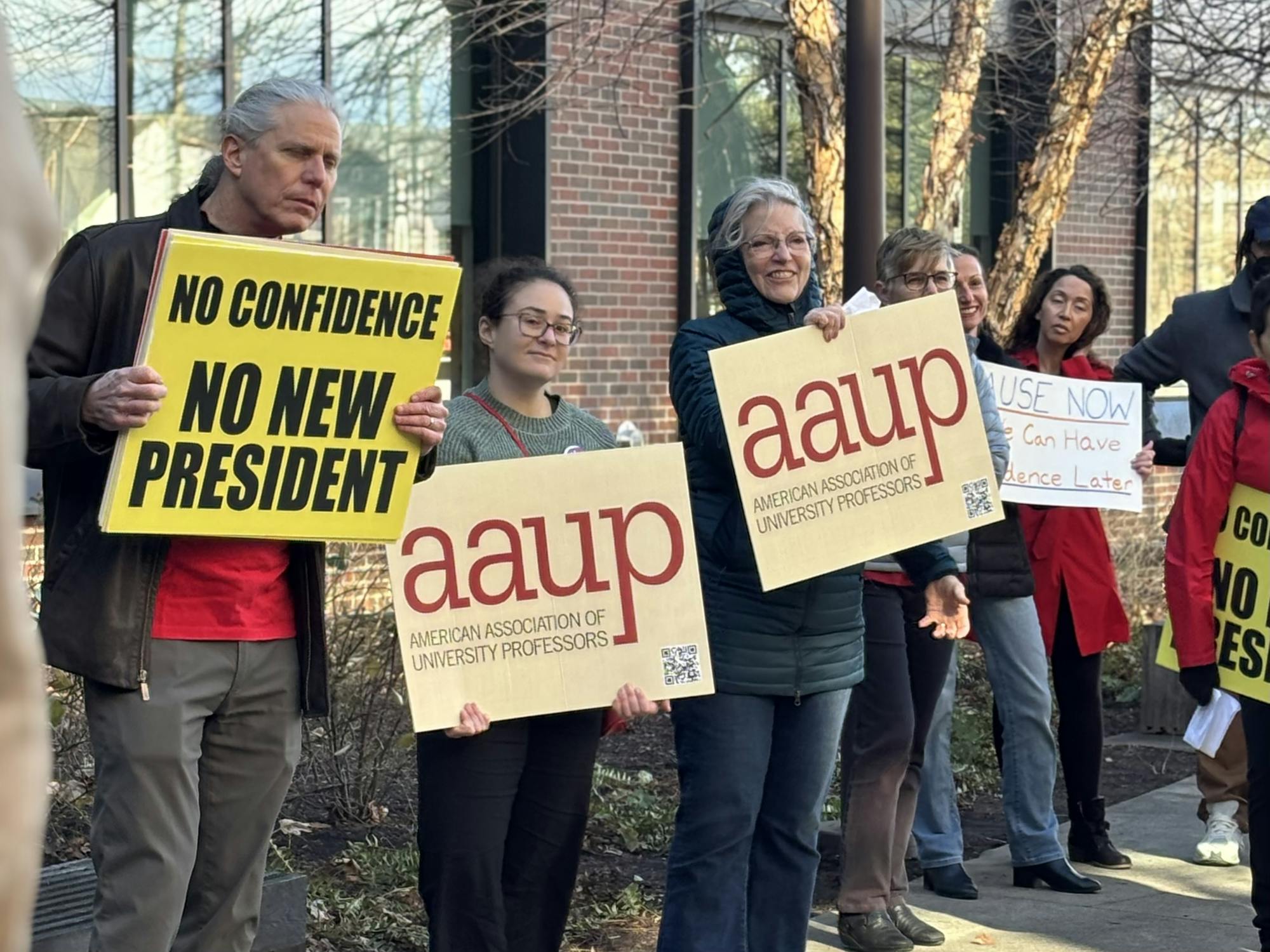 Protesters photographed outside of Board of Visitors meeting Friday