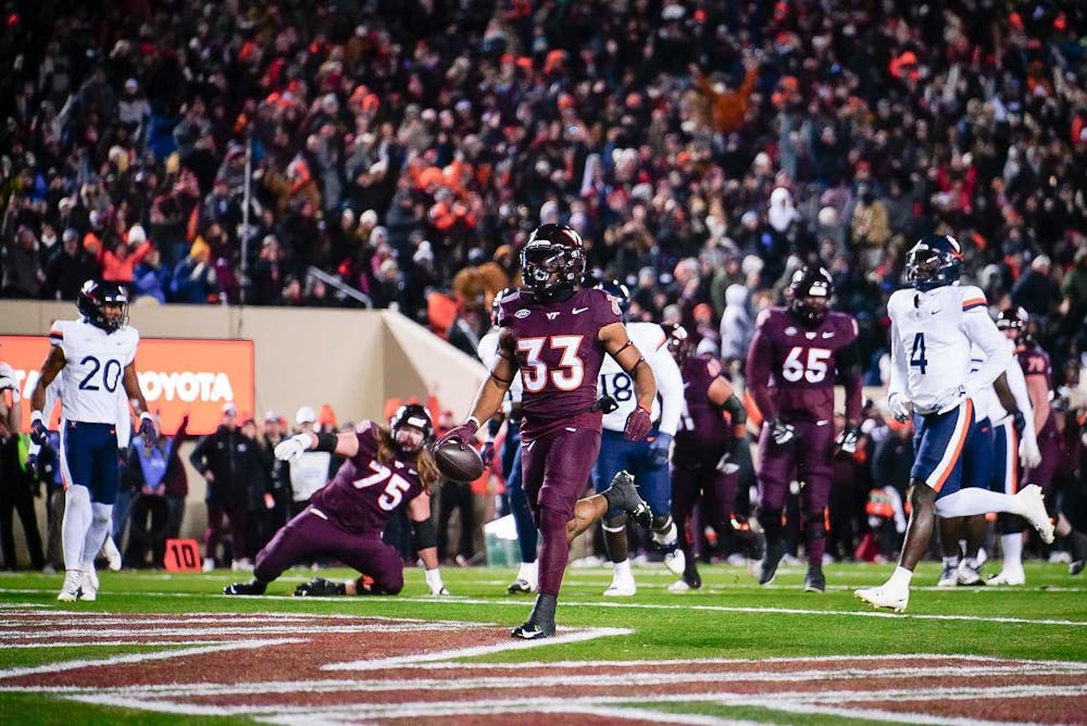 Senior running back Bhayshul Tuten scampers into the endzone.