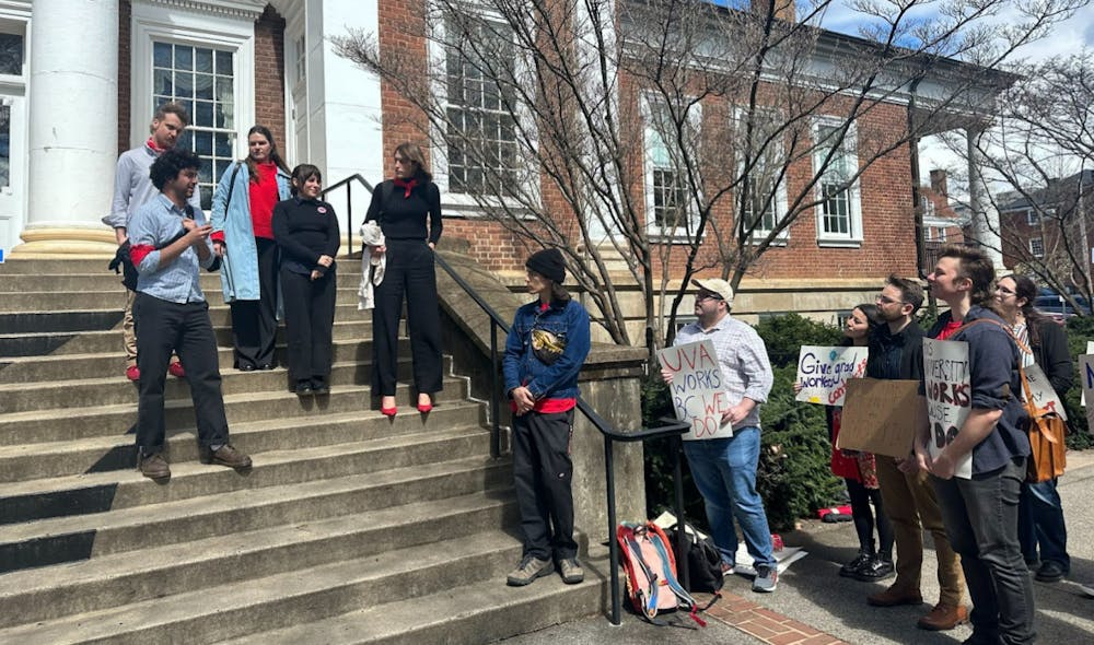 <p>After the meeting, leaders of the Cut the Checks <a href="https://ucwva.org/cutthechecks-uva-may-day-statement/"><u>campaign</u></a> held a press conference on the stairs of Madison Hall. &nbsp;</p>