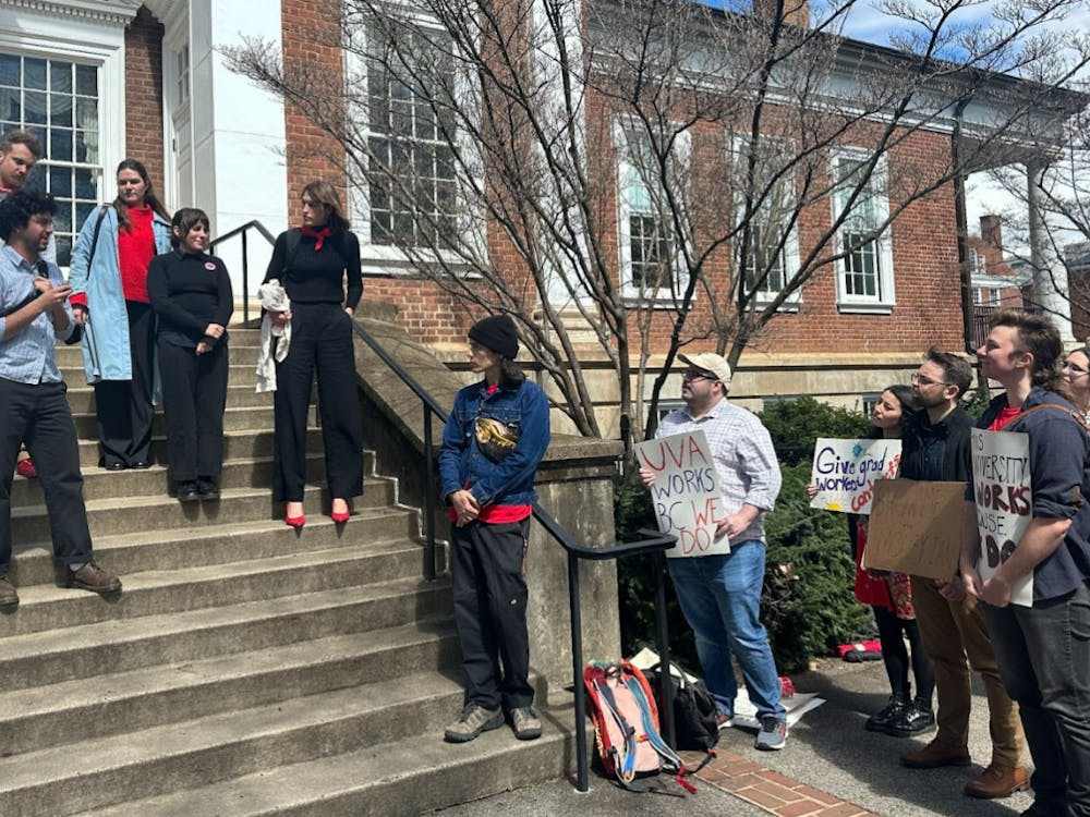 After the meeting, leaders of the Cut the Checks campaign held a press conference on the stairs of Madison Hall. &nbsp;