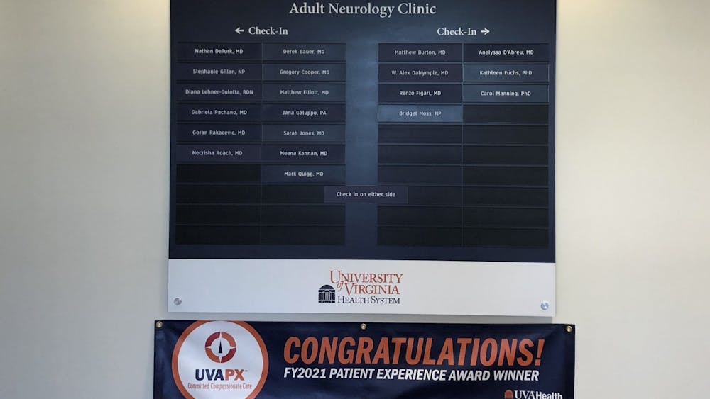 A sign applauds the University’s neurology clinics for their patient experience.