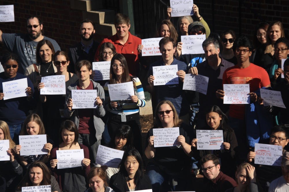 Pictures of attendees holding pieces of paper signaling their opposition to the bill were shared on social media.&nbsp;