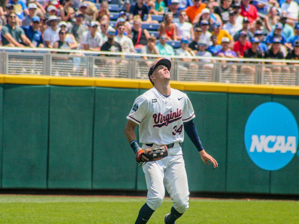 Harrison Didawick tracks down a fly ball.