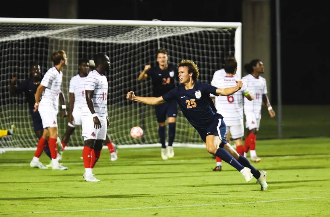 Freshman forward Andy Sullins celebrates after scoring his first collegiate goal Tuesday night.
