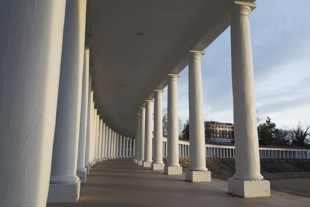 The victim reported that a man holding an unidentified object ordered her to stop on the Colonnades surrounding Lambeth Field.
