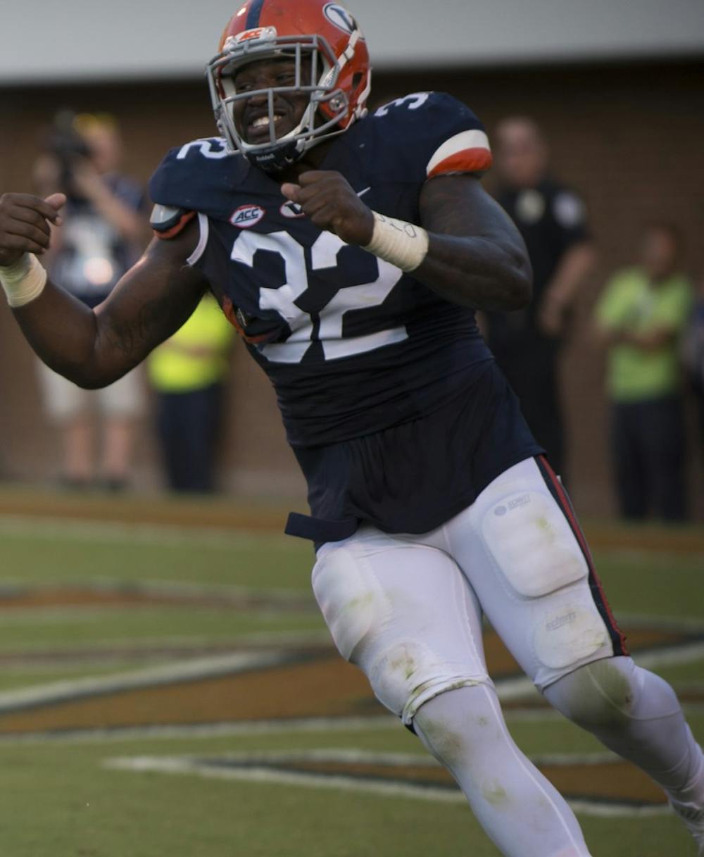 <p>Senior defensive end Mike Moore has five tackles for loss and two sacks in 2015. </p>