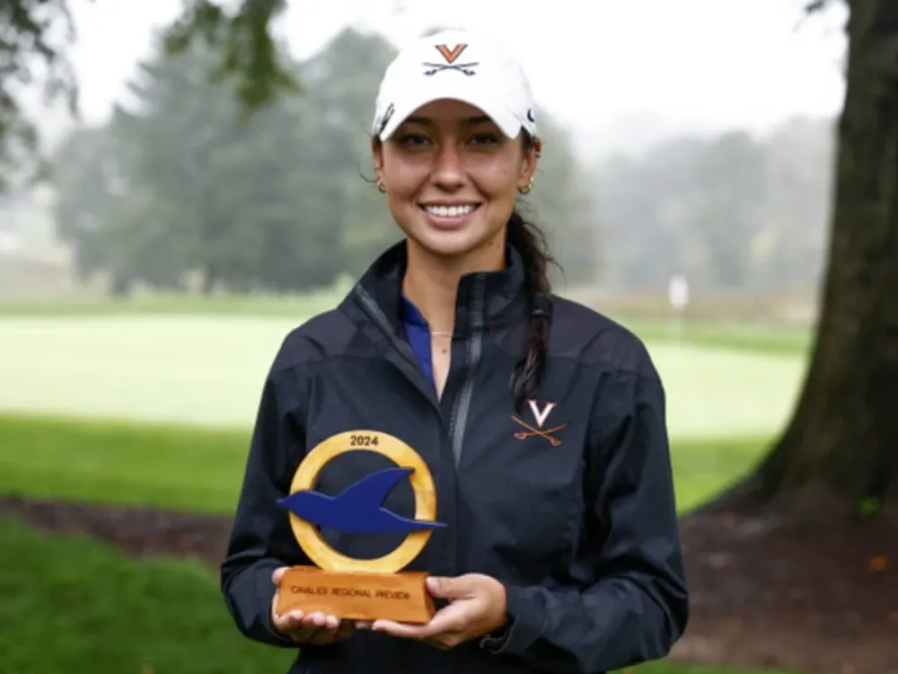 Senior Amanda Sambach hoists the runner-up trophy.