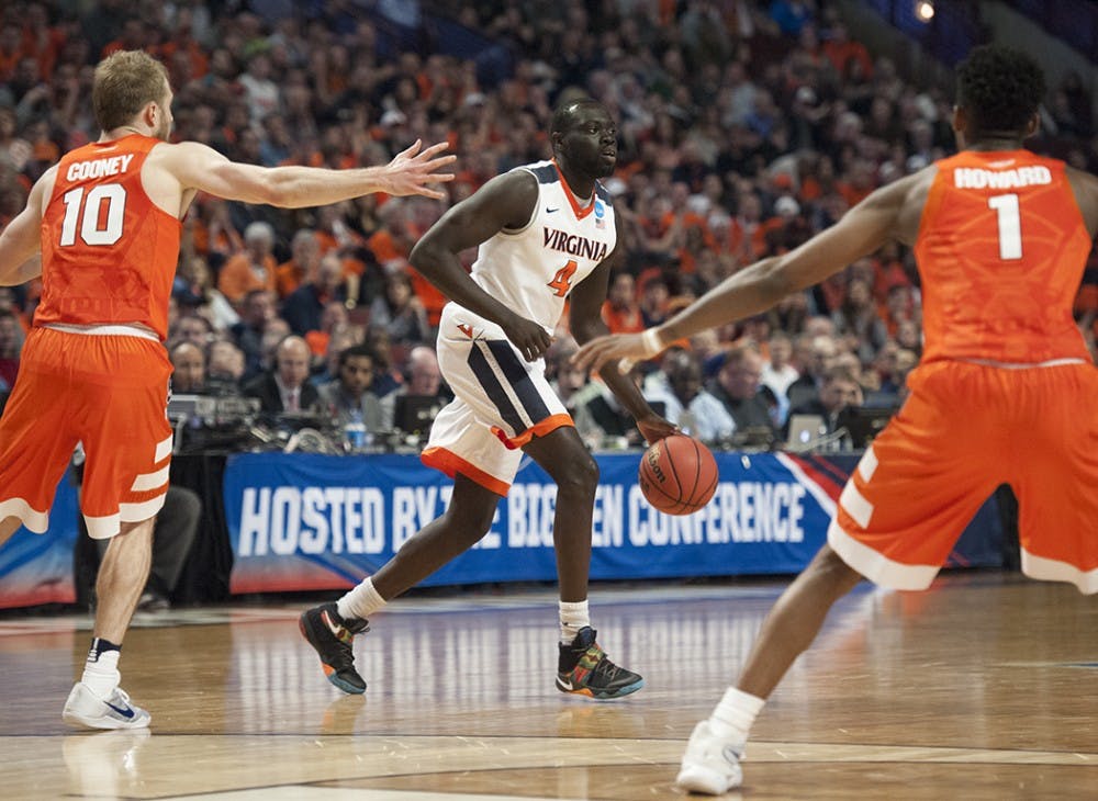 <p>Junior guard Marial Shayok came off the bench to score 15 points Friday night in Virginia's season-opening win against UNC Greensboro.</p>