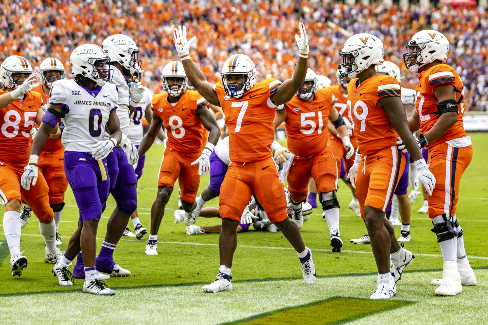 Senior running back Mike Hollins, who was injured in the shooting, scored two touchdowns Saturday.