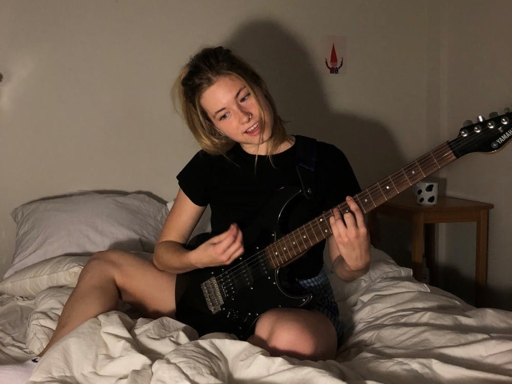 Most of the audience sat around Bollinger’s bouncing, bright white Skechers, gazing up at her like kindergarteners enchanted by the cool teacher who sings. 