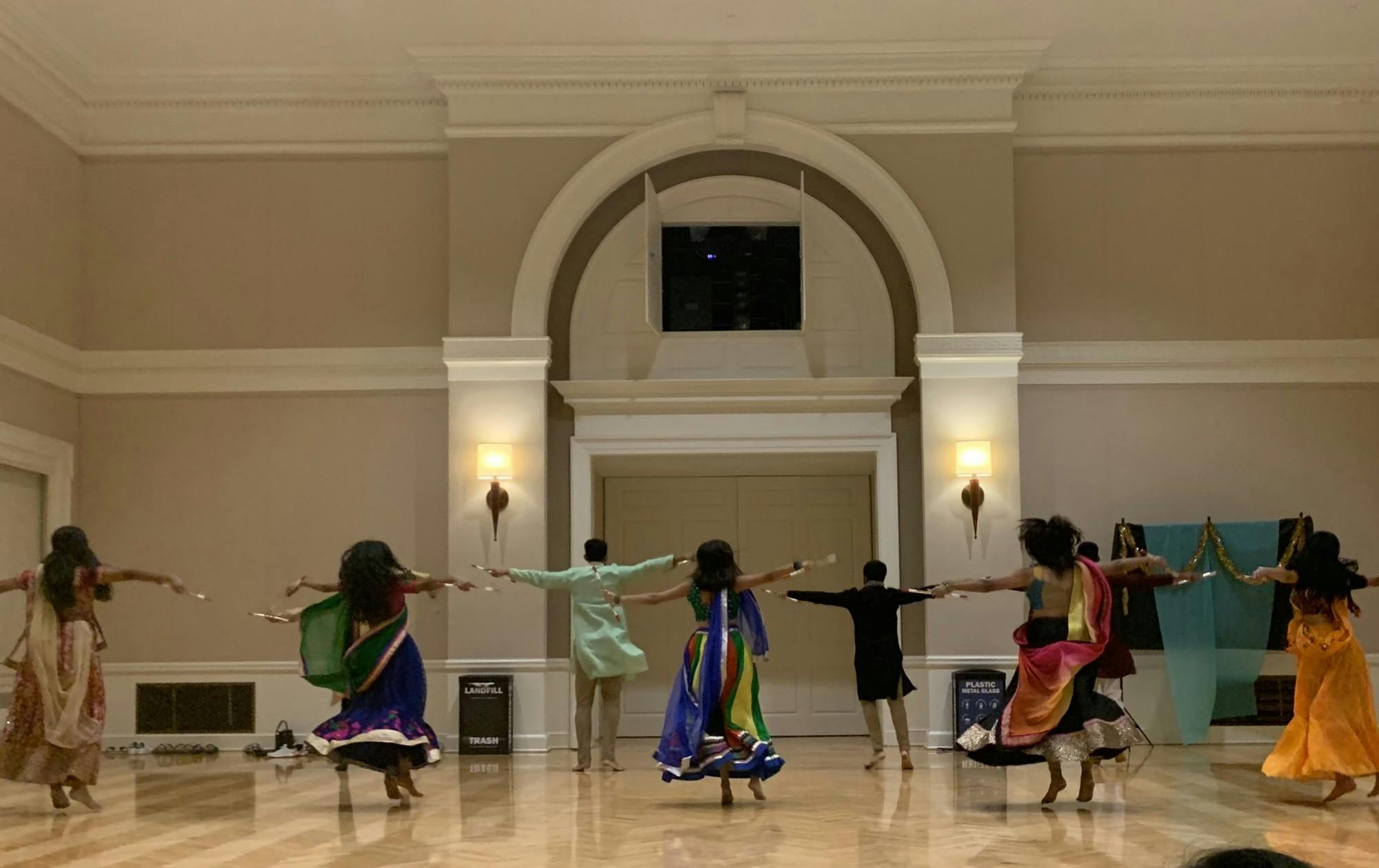 The ballroom was rife with sparkling chatter as attendees relished in delicious food and cheery company but was soon replaced with quiet awe as HooRaas — the University’s competitive co-ed dance team that specializes in garba — showcased a performance.&nbsp;