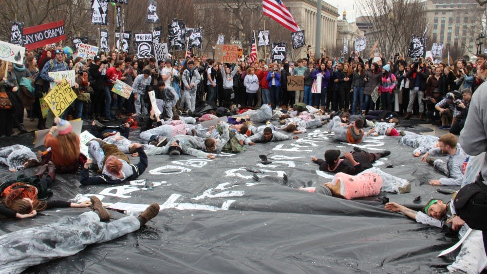 	<p>Hundreds of students from more than 40 universities and 42 states set up mock oil spills outside of Secretary of State John Kerry’s house and the White House while others zip-tied themselves to the White House fence.</p>