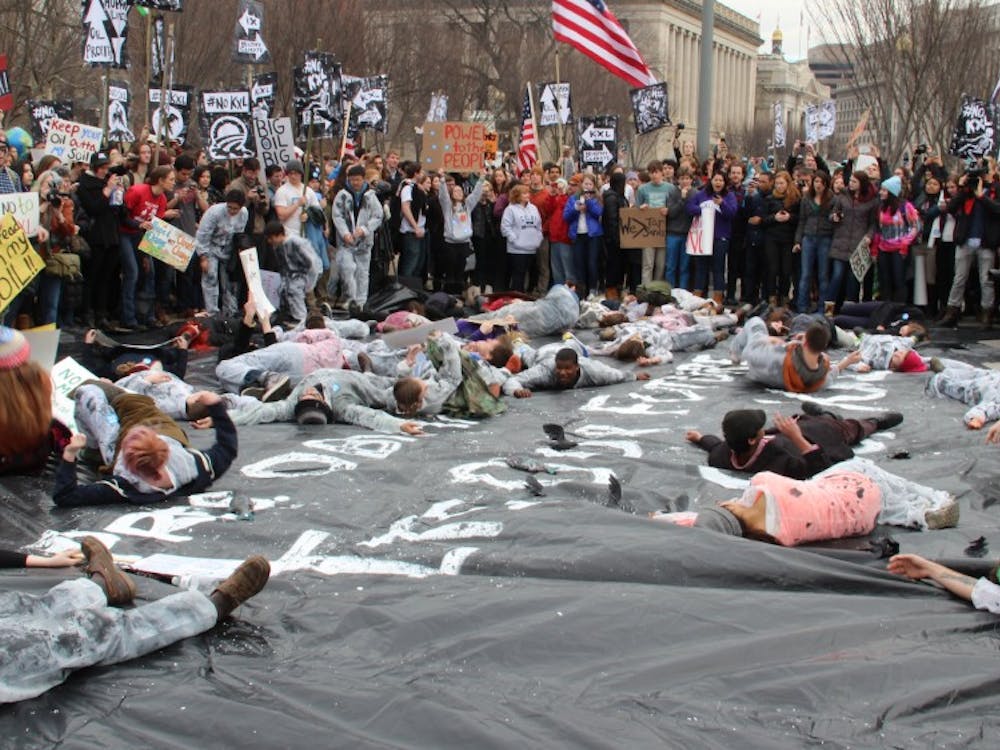 	Hundreds of students from more than 40 universities and 42 states set up mock oil spills outside of Secretary of State John Kerry’s house and the White House while others zip-tied themselves to the White House fence.