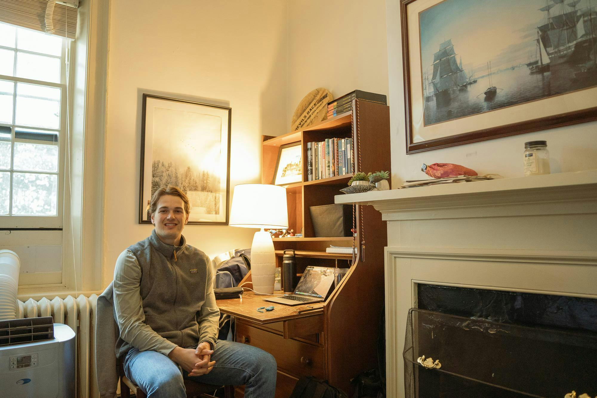 McNeal sits at his desk in 36 East Lawn.
