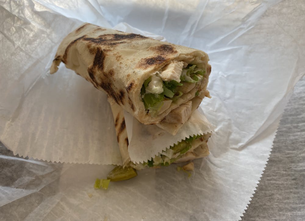 <p>The chicken shawarma flatbread was perfectly crispy, and the garlic sauce mixed well with the tender chicken.</p>