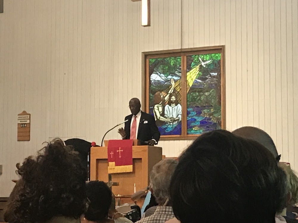 Past-president for the Albemarle-Charlottesville NAACP M. Rick Turner addresses the crowd on directly confronting the problems of racism and injustice.