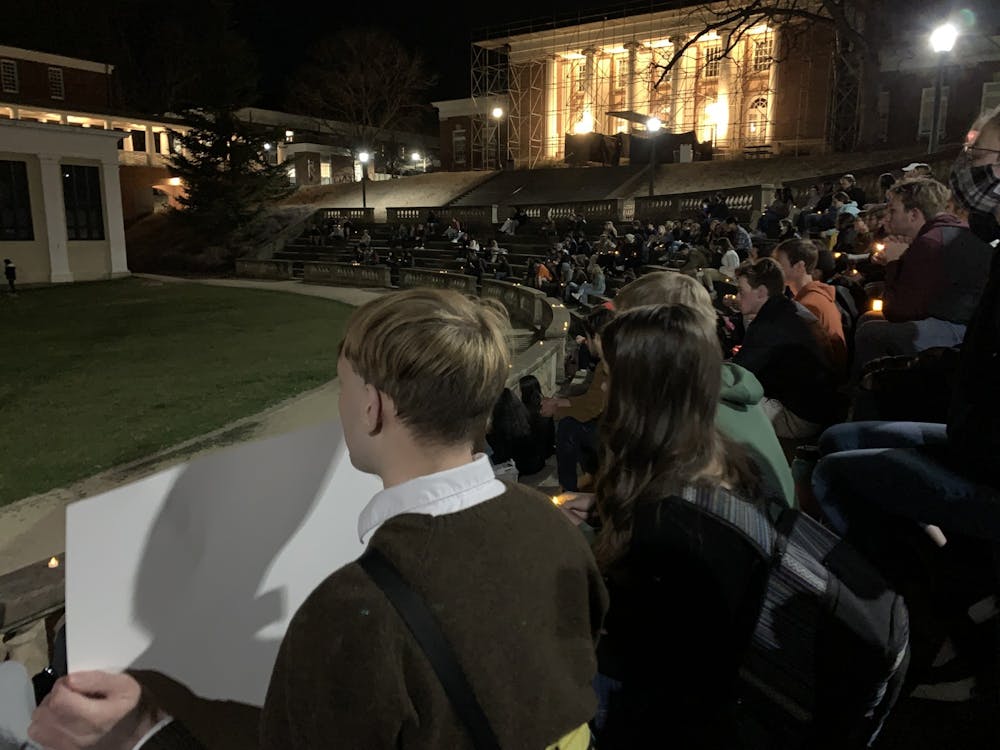 The McIntire Amphitheater — where the vigil was held — had full bleachers at the event's start. 