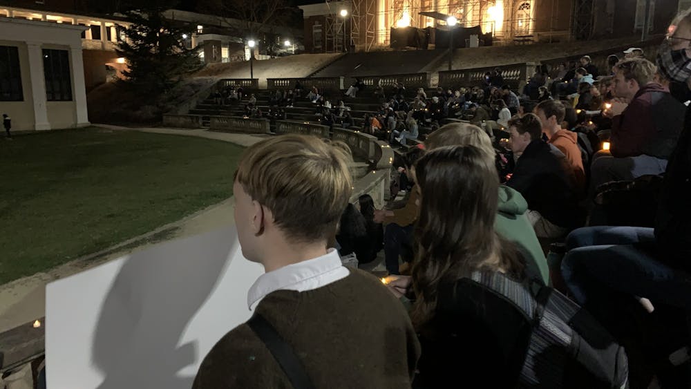 The McIntire Amphitheater — where the vigil was held — had full bleachers at the event's start. 