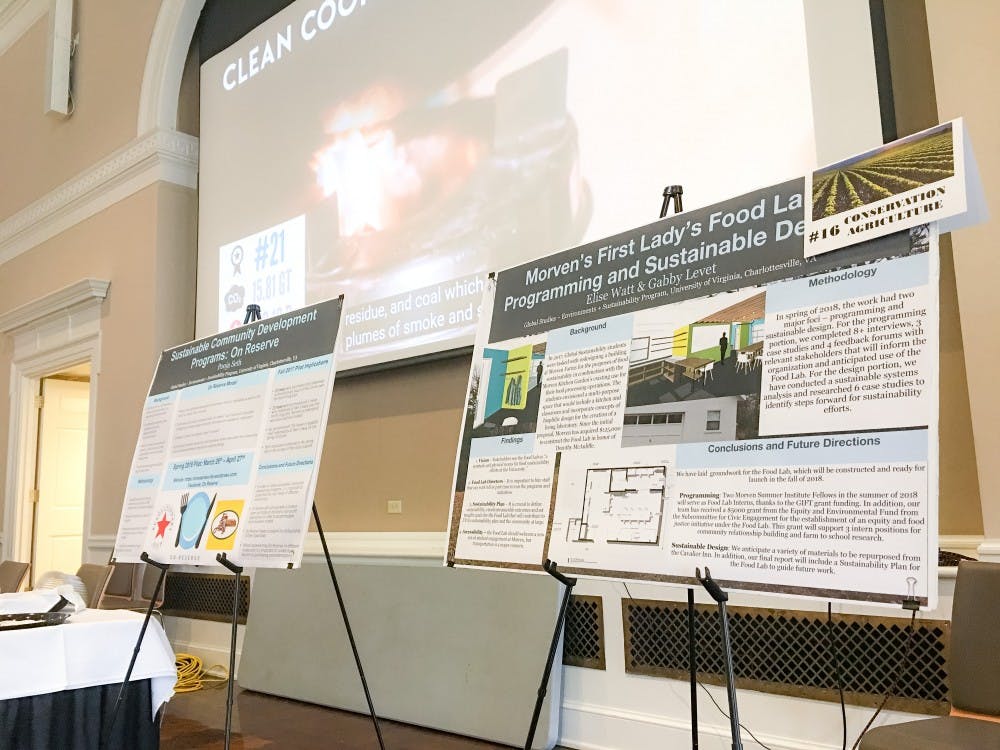 Poster boards at the climate expo display proposed solutions for mitigating climate change.