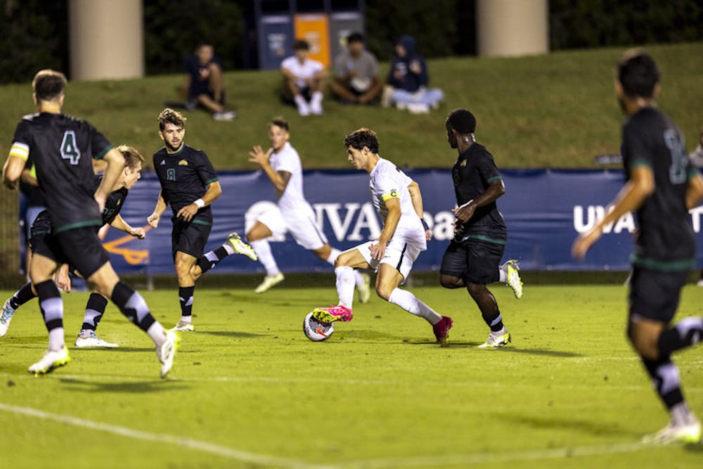 <p>Senior forward Leo Afonso provided the assist for the Cavaliers' only goal Thursday</p>