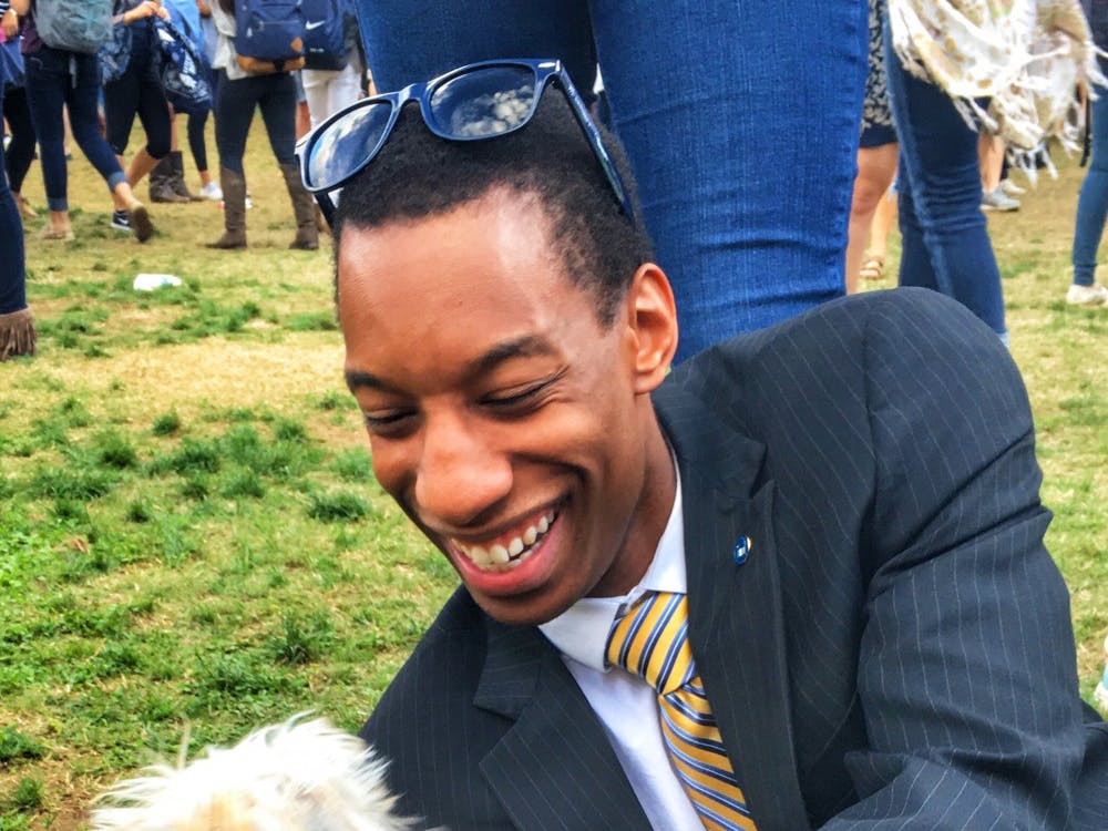 MalcolmYear: SecondMajor: UndecidedU.Va. involvement: Resident Advisor, University Guide, IM sports, Salsa Club novice, avid challah buyerHometown: Midlothian, VirginiaIdeal date: I ain’t got no type.Ideal date personality: Carries good conversation, would appreciate being swiped into Newcomb dining hall as a date.Ideal date activity: Sunrise hike at Humpback, breakfast with the residents (we’ll swipe you in again) and then play a rousing game of cards with us.Deal breakers? People who curse excessively (the only “F” word I use is “fun”), hates the movie “500 Days of Summer.”Describe a typical weekend: If I’m on coverage, it usually involves me hanging out with first-years. Otherwise, going to hang out with people who aren’t first-years.Hobbies: Humiliating residents in card games at 3 a.m., smiling, capturing the perfect Instagram photo (follow me @malcolmstewart4).What makes you a good catch? Winsome smile, it’s been said that I can make the perfectly cooked toaster strudel and I write fire coverage poems in my emails.What makes you a less-than-perfect catch? I’ve been telling myself for three years that I’ll start going to the gym. I keep going, but get distracted by the smoothies.What is your spirit animal? Papa Bear.What's your favorite pick-up line? If you were words on paper, you’d be fine print.Describe yourself in one sentence: My residents tell me that I have a good taste in shower music. 