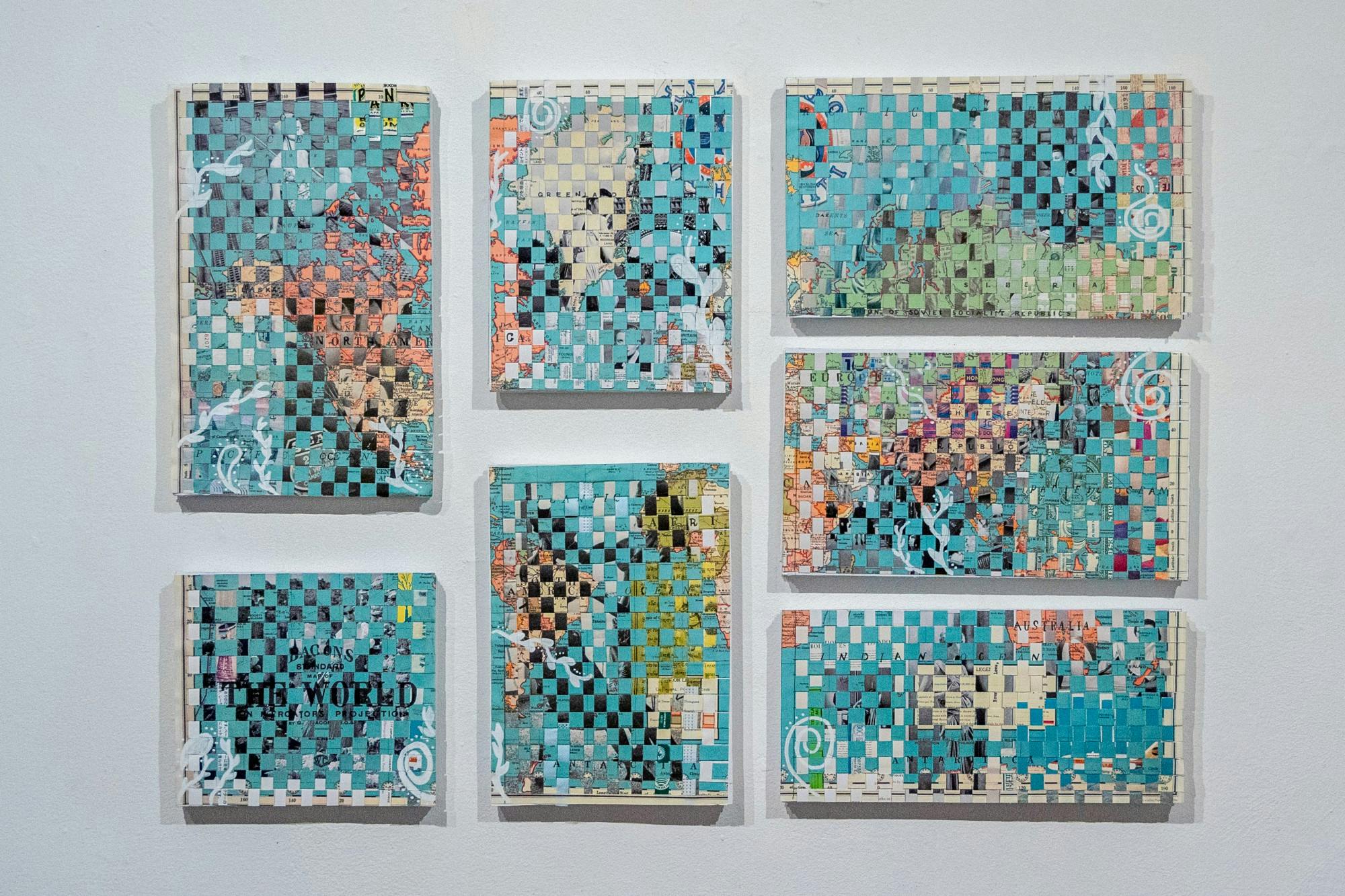 The Traveler is a woven depiction of a world map, constructed using materials Cochran sourced &nbsp;— food labels, masks or old prayer flags — to bring the meaning behind her idea to life.&nbsp;