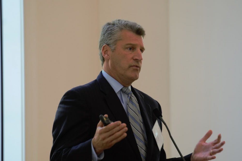 <p>University Counsel Tim Heaphy, pictured here speaking at a press conference in 2017, was removed by Attorney General Jason Miyares' office as part of a larger wave of firings.</p>