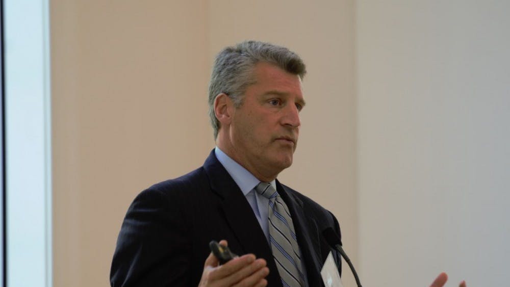University Counsel Tim Heaphy, pictured here speaking at a press conference in 2017, was removed by Attorney General Jason Miyares' office as part of a larger wave of firings.
