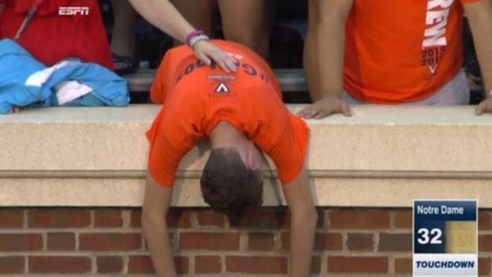 A disheartened University student after Virginia lost to Notre Dame in the fall 2015 football season.&nbsp;