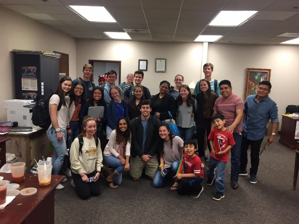 Student volunteers pose with participants in the Sín Barreras program this semester.