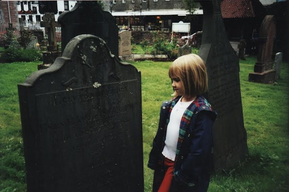 <p>Tori Travers explores a graveyard in Scotland at the age of five.</p>