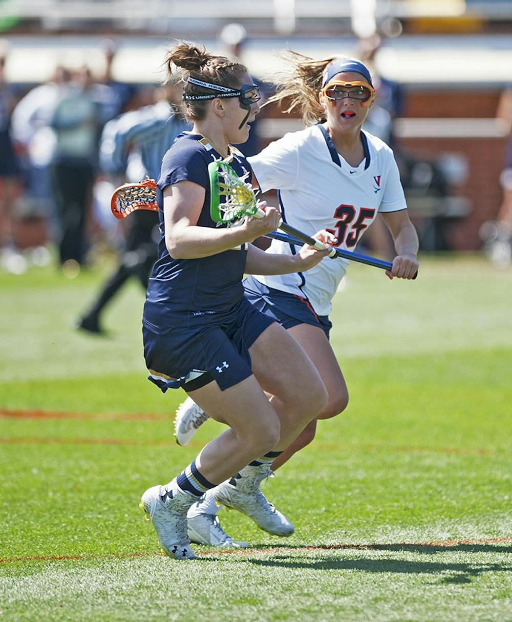 <p>Senior attacker Kelly Boyd and her twin sister, Brooke, have been playing lacrosse together since kindergarden. The decision to attend Virginia together was an easy one for both.</p>