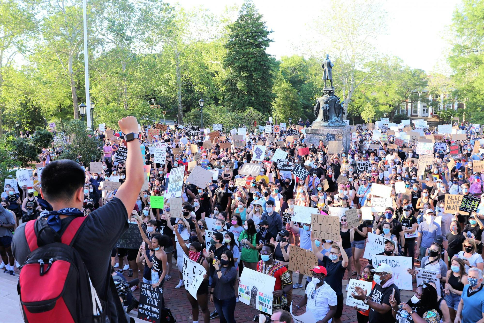 The march to remove Confederate monuments in Charlottesville convened at the Rotunda after marching from downtown. (CD Photo // Geremia Di Maro)
