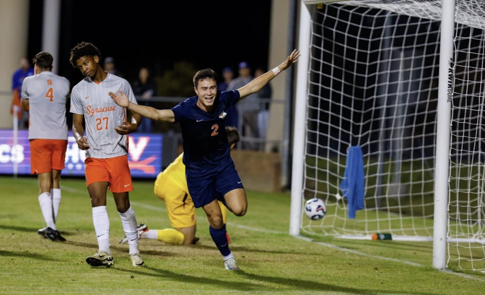 <p>Nick Dang celebrates after scoring the third goal Saturday evening.</p>