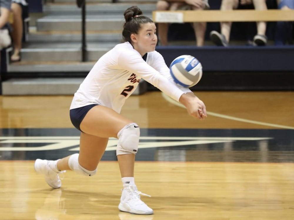 Sophomore outside hitter Alex Spencer had five kills in the first set against Louisville Friday.