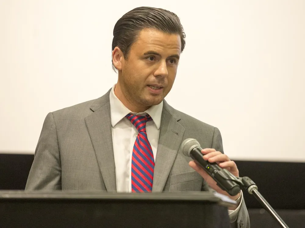 Jeff Thomas speaking at the University on April 28. 