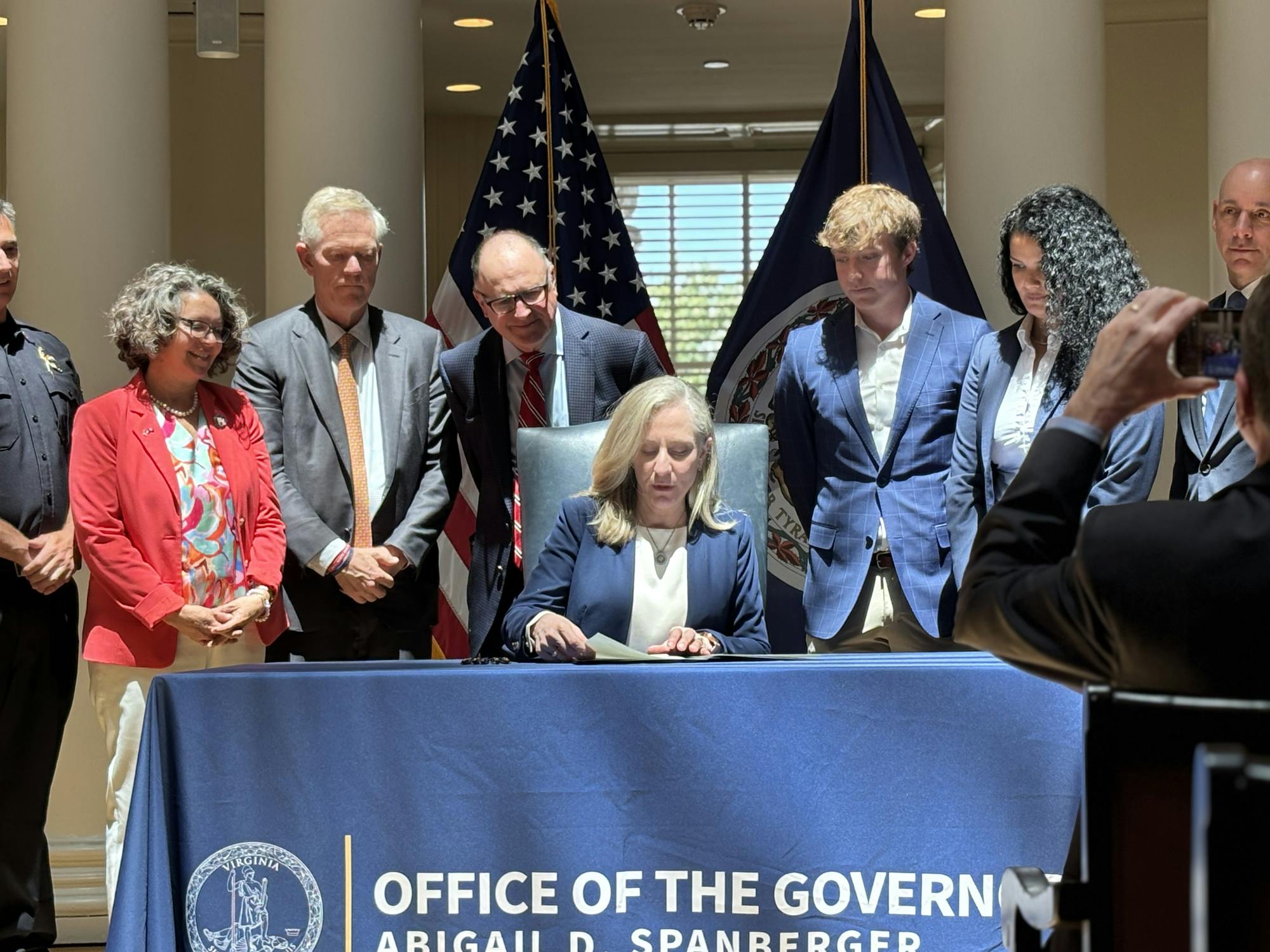 Spanberger signs legislation to instate a firearm ban on college campuses.