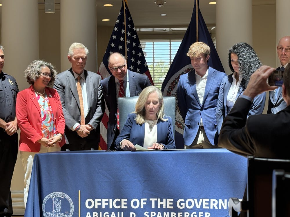 Spanberger signs legislation to instate a firearm ban on college campuses.