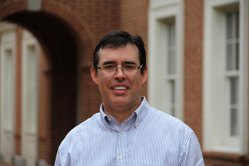 Curry School Special Education Asst. Prof. Michael Solis works with high functioning autistic students using interest-based reading and positive behavior support to help them focus on learning 