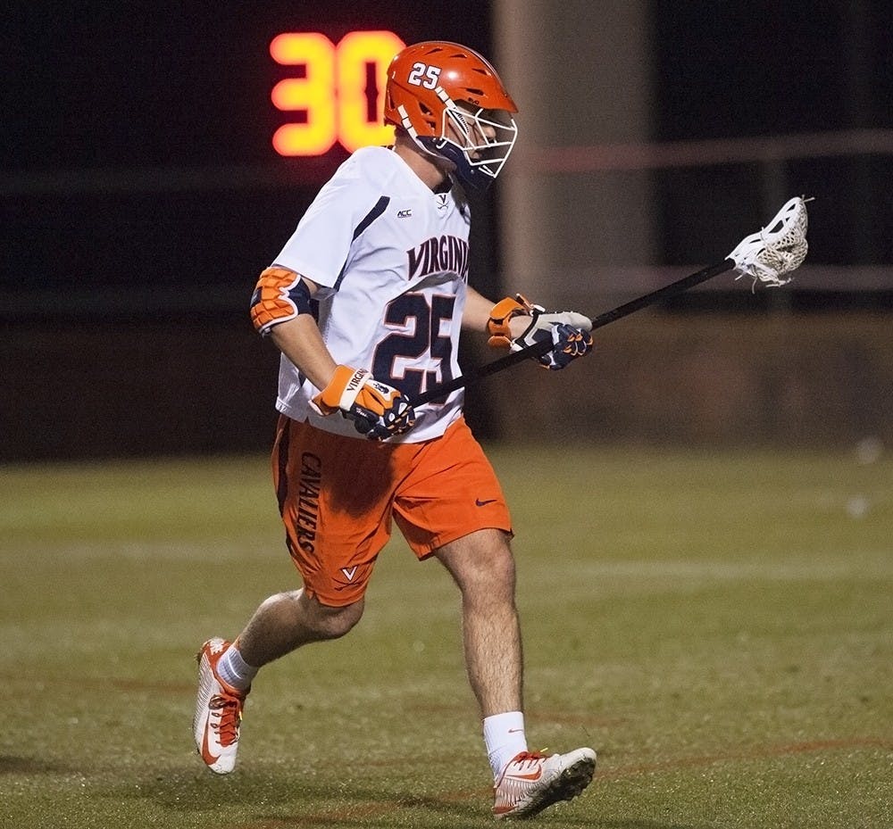 Senior defenseman Scott Hooper started 13 of 15 games as a freshman, and is now captain of the Cavaliers.