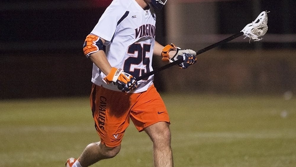 Senior defenseman Scott Hooper started 13 of 15 games as a freshman, and is now captain of the Cavaliers.
