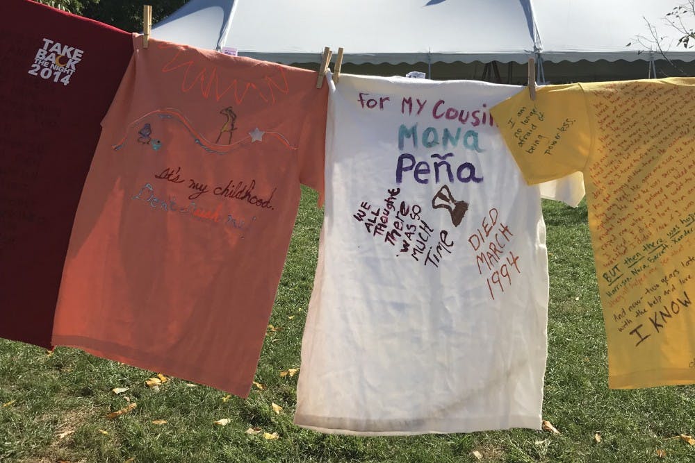 <p>Each t-shirt displayed outside of New Cabell Hall was emblazoned with a message written by a survivor of intimate partner violence.&nbsp;</p>