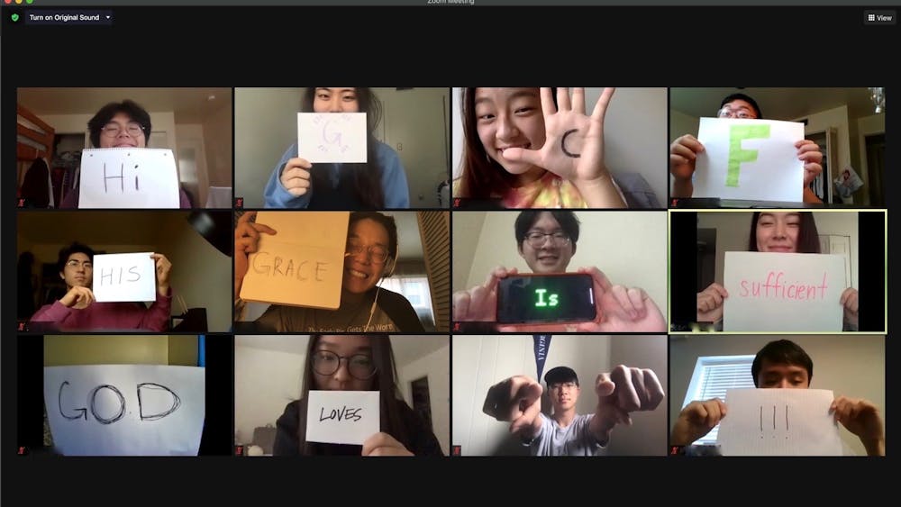 GCF's Praise Team pose for a Zoom screenshot with an encouraging message shared with the rest of the fellowship over social media.