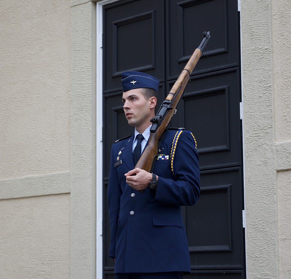 <p>A&nbsp;University ROTC member marching during 24-hour vigil held in the Amphitheatre to honor prisoners of war and those missing in action.&nbsp;</p>