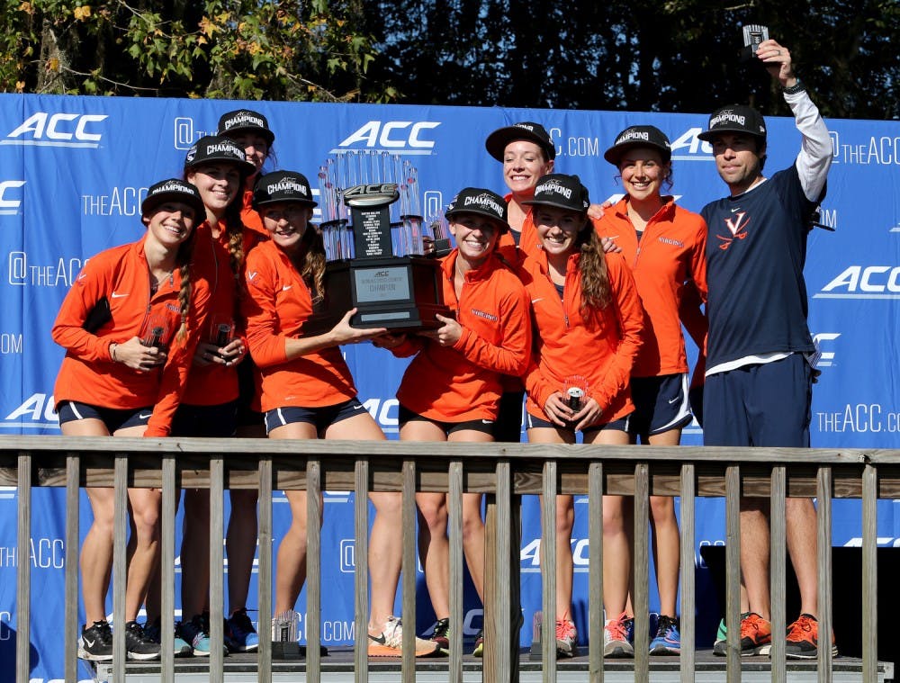 Members of the Virginia Cavaliers celebrate their Championship after the 2015 ACC Cross Country Championship in Tallahassee, Fl., Friday,Oct. 30, 2015. (Photo by Glenn Beil, theACC.com)