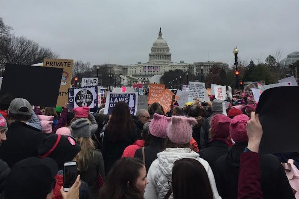 <p>Protesters participating in the Women's March on Washington held signs advocating for women's rights outside the nation's capital.&nbsp;</p>