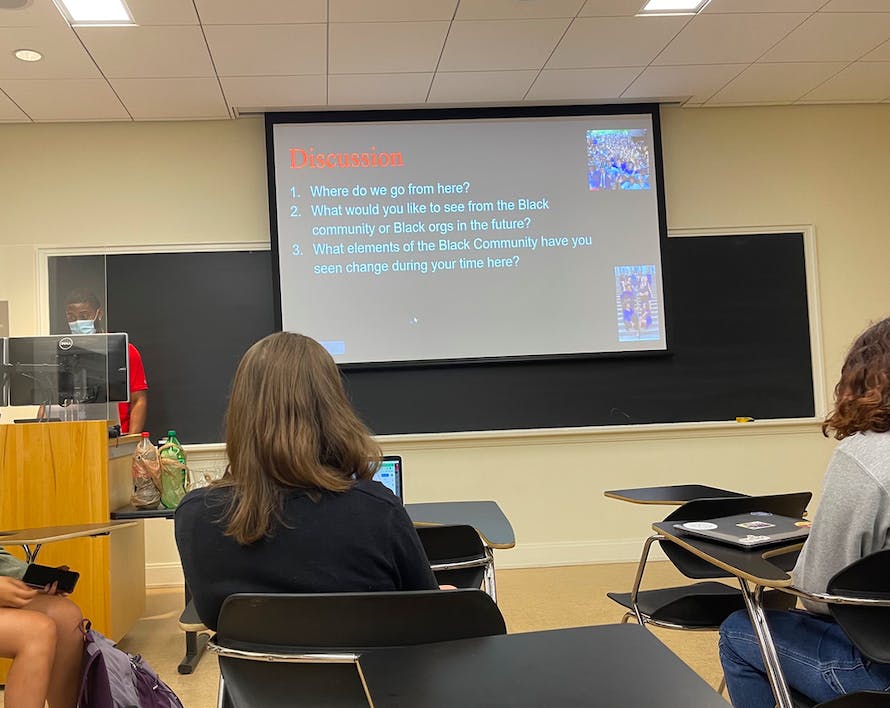 Deric Childress Jr., president of the Black Student Alliance and fourth-year College student, presents at the first Memory Monday event.